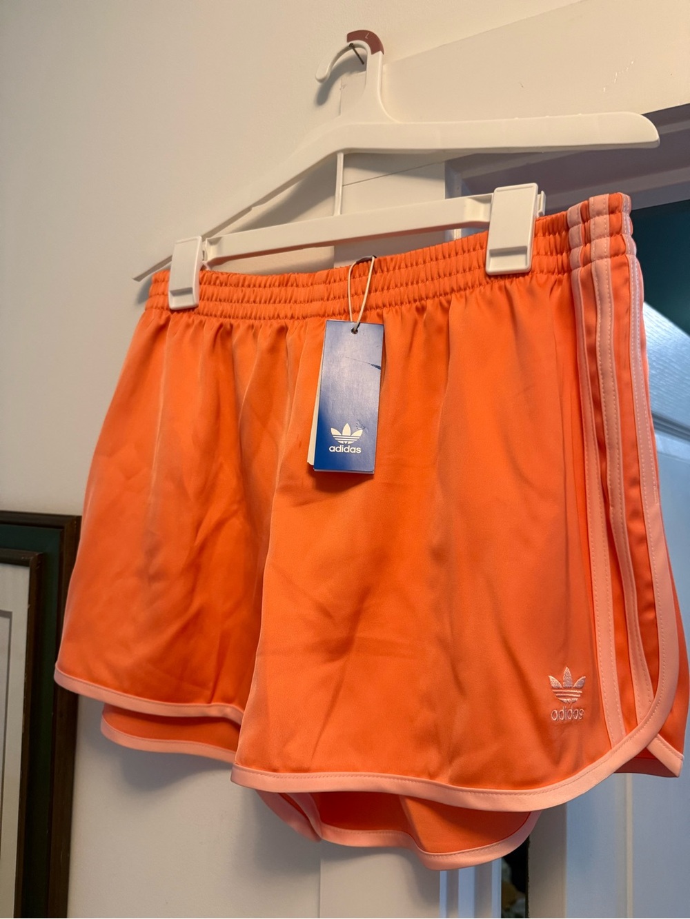 adidas Women's Orange Athletic Track Shorts with Side Stripes